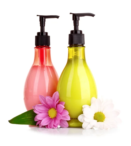 Flower and liquid soap isolated on white — Stock Photo, Image