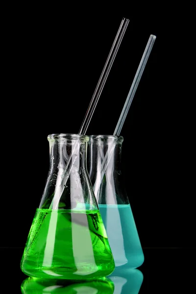 Laboratory glassware on black background — Stock Photo, Image