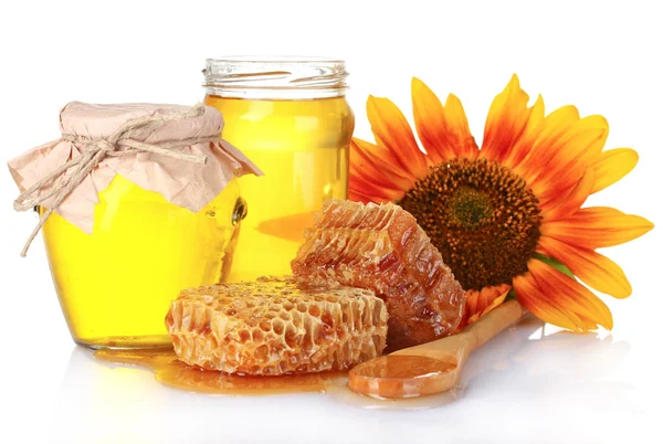 Bellissimi pettini, miele, cucchiaio e girasole — Foto Stock