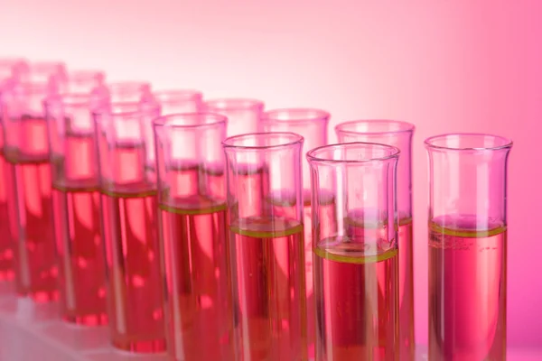 Test-tubes on red background — Stock Photo, Image