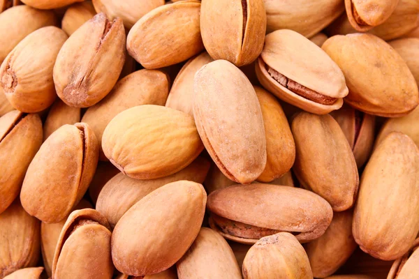 Pimpernoten (pistaches) noten achtergrond — Stockfoto