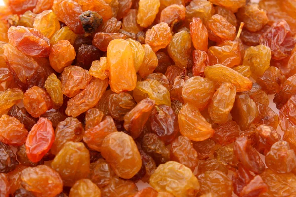 Yellow raisins background — Stock Photo, Image