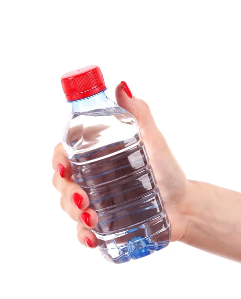 Mão de mulher e garrafa de água — Fotografia de Stock