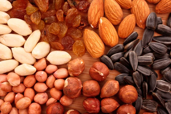 Nuts, raisins and sunflower seeds — Stock Photo, Image