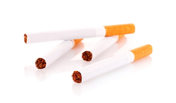 Many cigarettes isolated on white Stock Picture