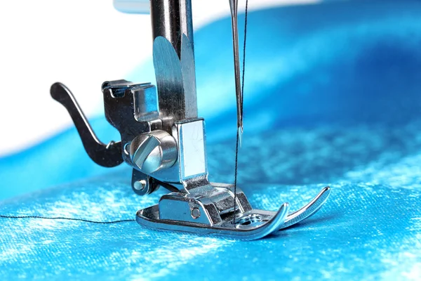 Sewing machine and item of clothing Stock Image