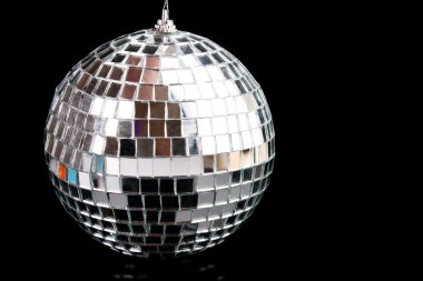 Sparkling glass disco ball isolated on black clipart