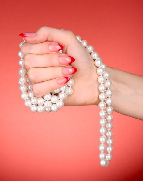 Perlen in der Hand — Stockfoto