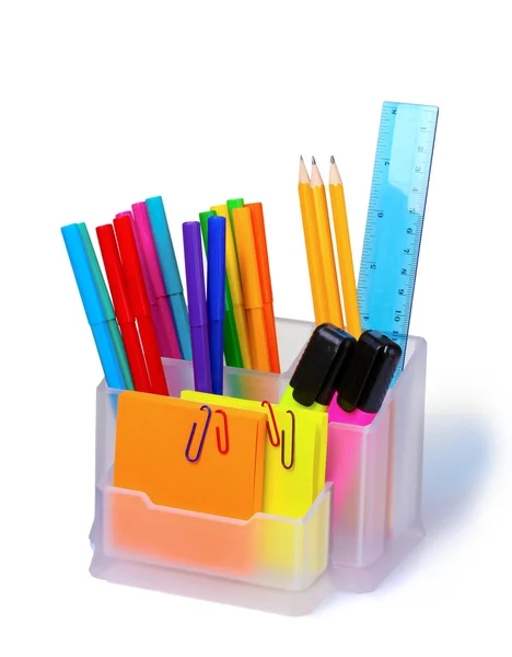 Lápices y bolígrafos en el soporte y la línea — Foto de Stock