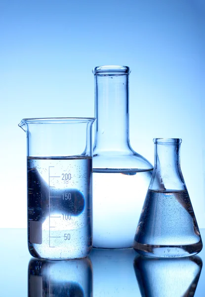 Test-tubes blue colors. Laboratory glassware — Stock Photo, Image