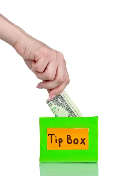 stock image Tips box for money and hand isolated on white