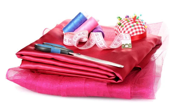 Červené, modré a růžové vlákno, měřicí pásky a tkaniny — Stock fotografie