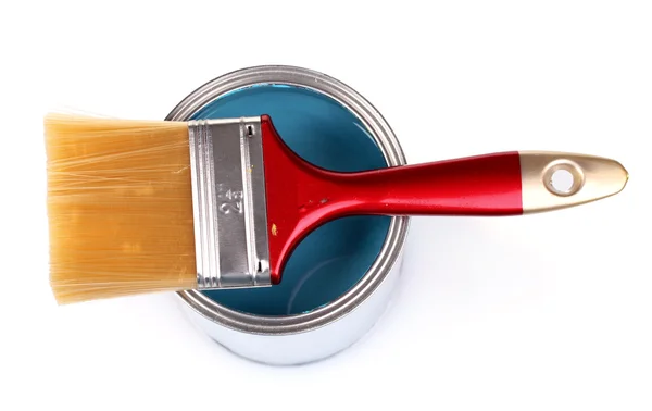 Open can of blue paint and brush — Stock Photo, Image