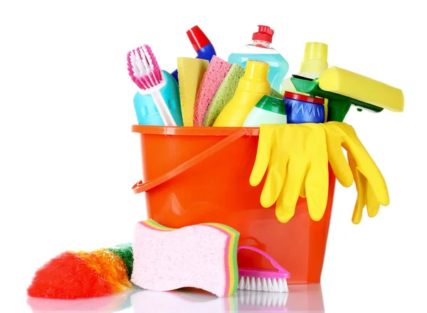 Detergent bottles, brushes and sponges in bucket — Stock Photo, Image