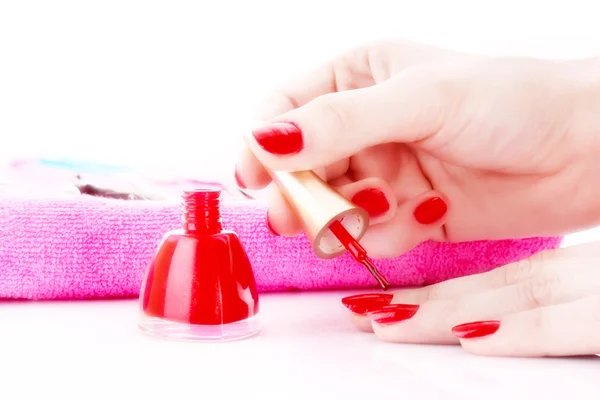 Young girl cover her nails with varnish — Stock Photo, Image