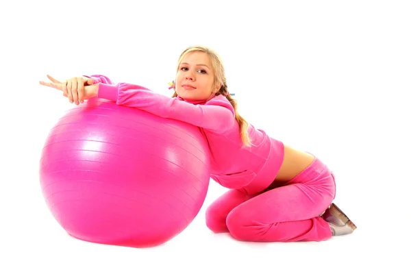 Vrouw met oefening bal geïsoleerd op wit — Stockfoto