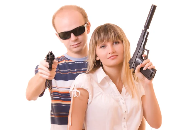 Homem e mulher com armas isoladas em branco — Fotografia de Stock