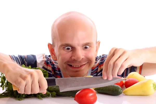 Crazy man cooking with tomato, cucumber, pepper and onion — Stock Photo, Image