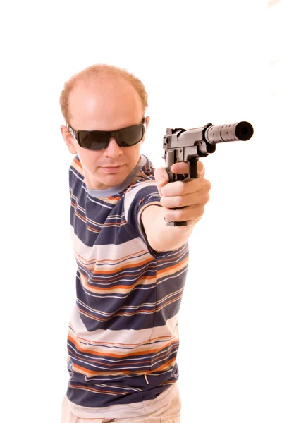 Young man aiming with gun isolated — Stock Photo, Image