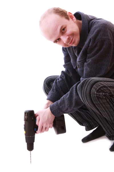 Hombre con una máquina de perforación — Foto de Stock