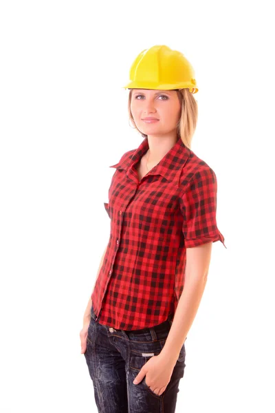 Junge Frau mit gelbem Helm isoliert auf weißem Grund — Stockfoto