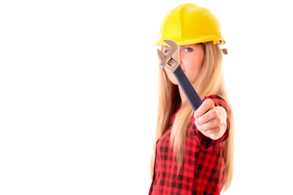 Young woman in helmet with adjustable wrench isolated on white — Stock Photo, Image