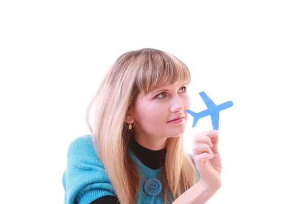 Ung flicka med flygplan i händer — Stockfoto