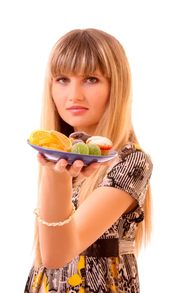 Ung flicka äter frukt gelé isolerad på vit — Stockfoto