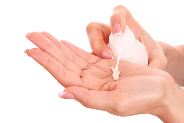 Närbild av vackra kvinnliga händer tillämpa hand cream isolerad o — Stockfoto