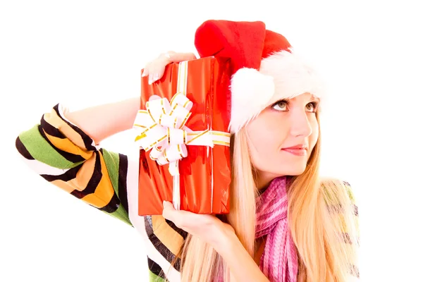 Young woman with christmas hat and gift isolated on white — Stock Photo, Image