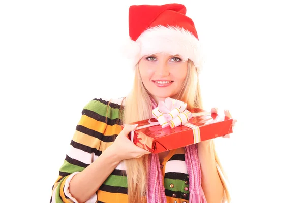 Молода жінка з різдвяним капелюхом і подарунком ізольована на білому — стокове фото