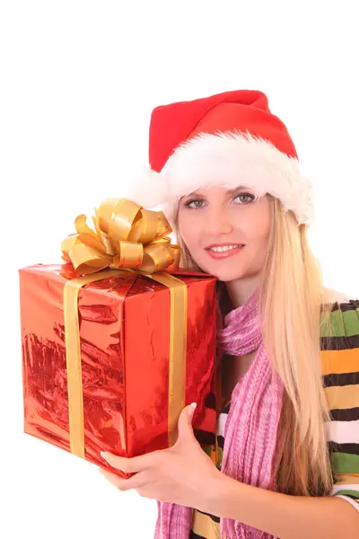 Jonge vrouw met kerst hoed en cadeau geïsoleerd op wit — Stockfoto