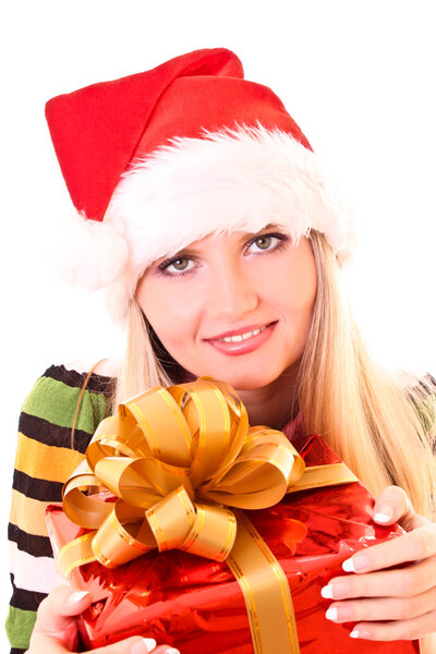 Young woman with christmas hat and gift isolated on white