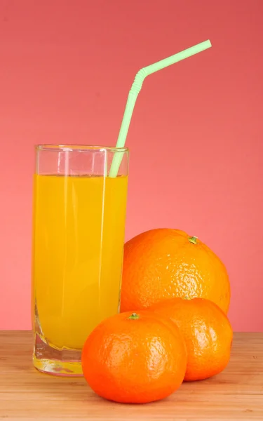 Fresh oranges and juice — Stock Photo, Image