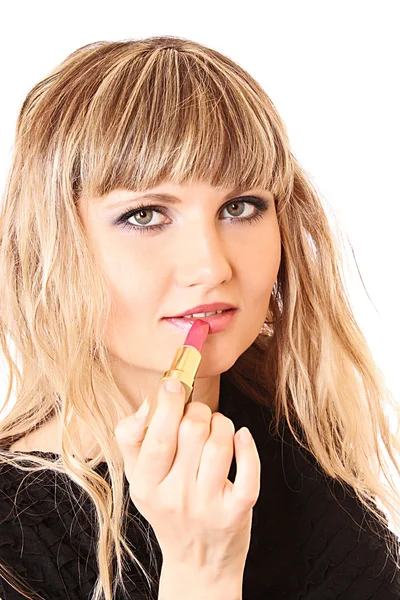 Mooi meisje die deel uitmaken van haar lippen met lippenstift — Stockfoto