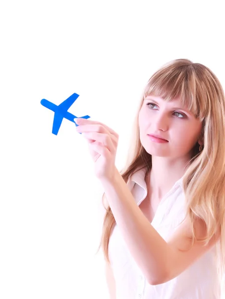Frau mit Kleinflugzeug in den Händen isoliert auf weiß — Stockfoto