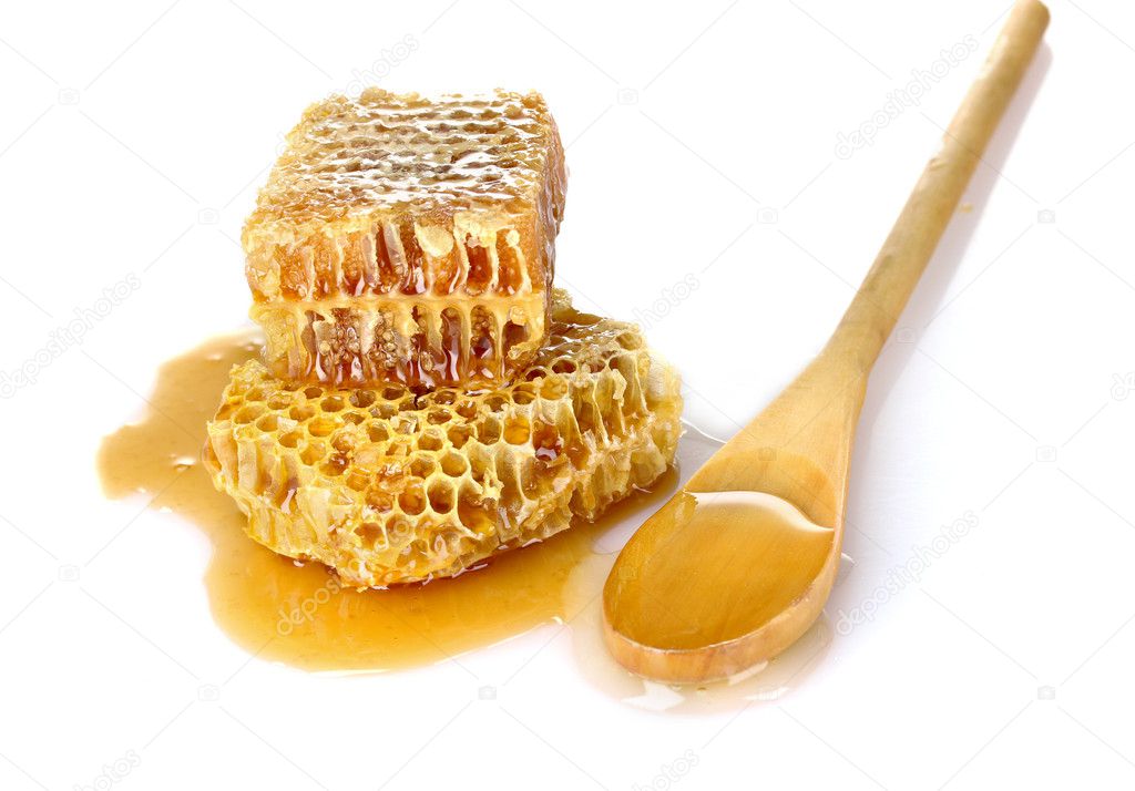 Beautiful combs, spoon and honey