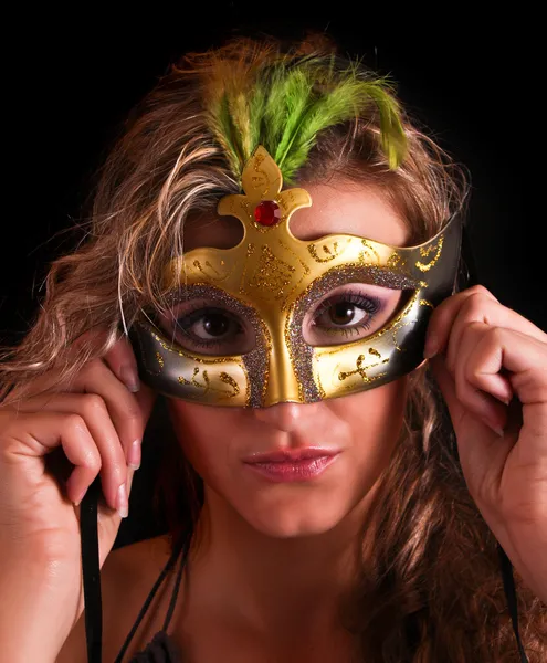 Beautiful woman in mask on black background — Stock Photo, Image
