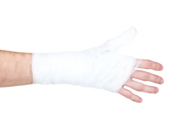 Bandajlı el üzerinde beyaz izole — Stok fotoğraf