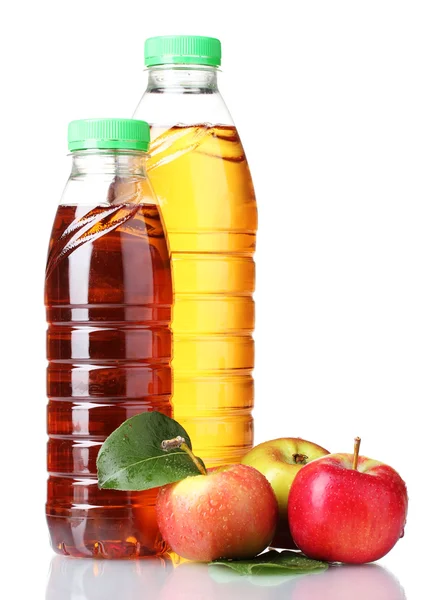 Delicious apple juice in bottles and apples isolated on white — Stock Photo, Image