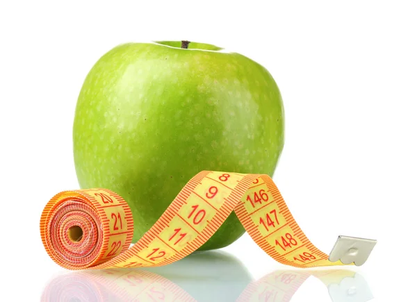 Green apple and measuring tape — Stock Photo, Image