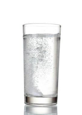 Glass with efervescent tablet in water clipart