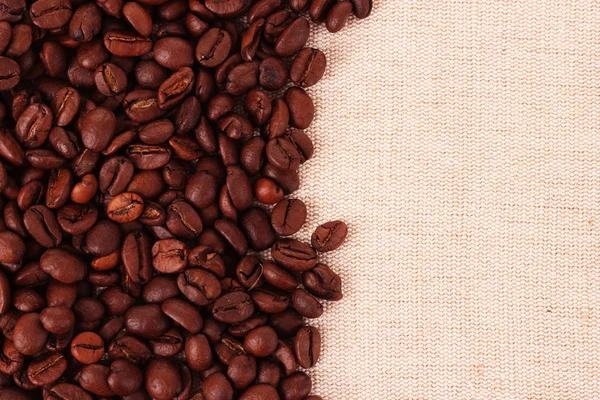 stock image Coffee beans in the background