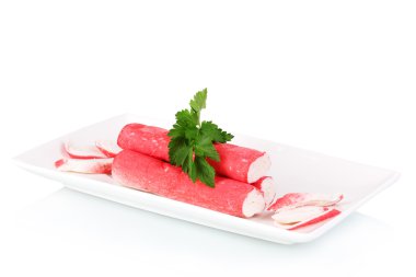 Crab sticks on plate isolated on white