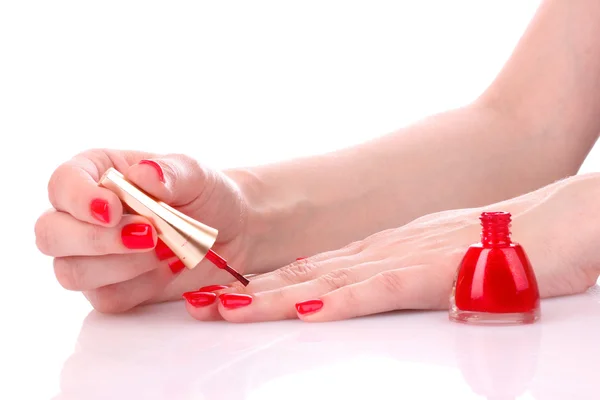 Woman's hand and red lacquer — Stock Photo, Image