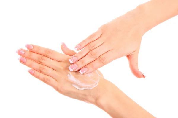 Closeup of beautiful female hands applying hand cream — Stock Photo, Image