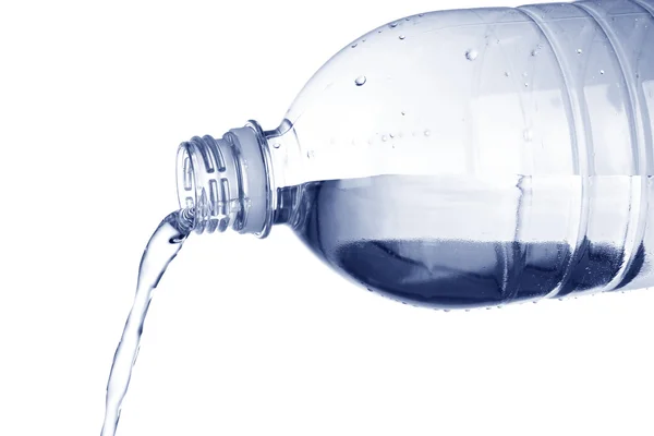 Fresh water pouring from plastic bottle — Stock Photo, Image