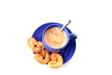 Cup of coffee with milk and cookies isolated over white backgro