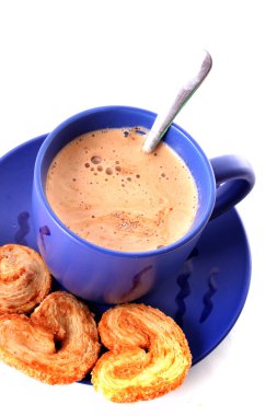 Cup of coffee with milk and cookies isolated over white backgrou