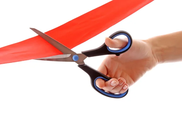 Red ribbon with scissors isolated on white — Stock Photo, Image